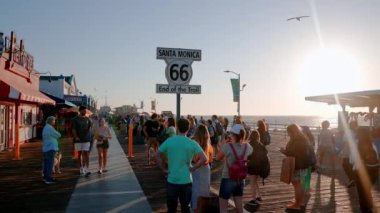 Sign of the end of the Route 66 at the Pacific amusement park on the Santa Monica Pier. The end of historical route across America.