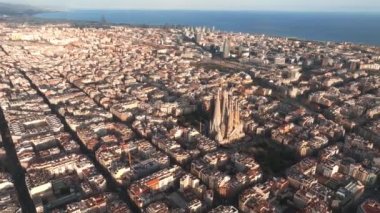Aerial view of residence districts in European city of Barcelona. Sunset over beautiful Barcelona city.