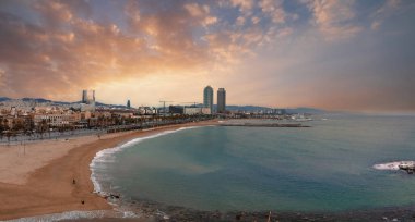 Panoramic aerial view of famous Barceloneta beach with hotel luxury W Barcelona. Birds eye of Barcelona, Catalunya, Spain.