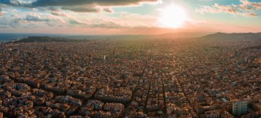 Barcelona street aerial view with beautiful patterns in Spain. Barcelona sunset skyline aerial view with buildings in Spain. Magical sunset over Barcelona.