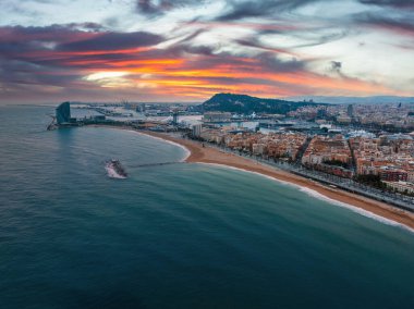 Panoramic aerial view of famous Barceloneta beach with hotel luxury W Barcelona. Birds eye of Barcelona, Catalunya, Spain.