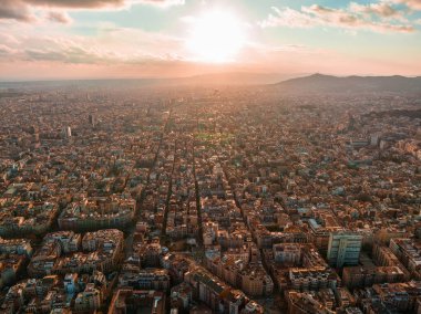 Barcelona street aerial view with beautiful patterns in Spain. Barcelona sunset skyline aerial view with buildings in Spain. Magical sunset over Barcelona.