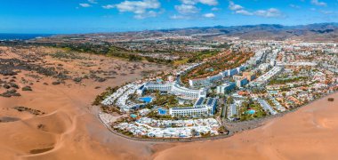 Hotel Riu Palace from above. Luxury grand accommodation with beautiful scenery of the famous desert dunes.