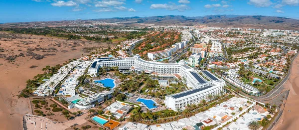 Hotel Riu Palace from above. Luxury grand accommodation with beautiful scenery of the famous desert dunes.
