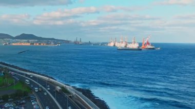 Panoramic aerial view of Las Palmas de Gran Canaria and Las Canteras beach at sunset, Canary Islands, Spain.