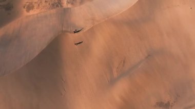 Panoramic aerial scene of the Maspalomas Dunes in Playa del Ingles, Maspalomas, Gran Canaria, Spain. Endless desert sands. Magical safari dunes.