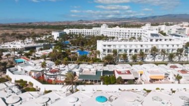 Hotel Riu Palace from above. Luxury grand accommodation with beautiful scenery of the famous desert dunes.