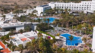 Hotel Riu Palace from above. Luxury grand accommodation with beautiful scenery of the famous desert dunes.