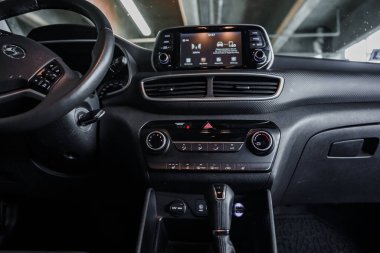 Hyundai Tucson interior design close up front view on the parking space