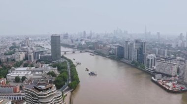 Beautiful city of London, UK. A view from above. Aerial view of the Thames river going through the center of London. 