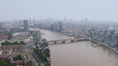 Beautiful city of London, UK. A view from above. Aerial view of the Thames river going through the center of London. 