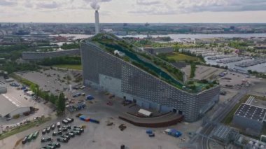 Amager Bakke, Amager Hill or Amager Slope or Copenhill - a heat and power waste-to-energy plant and a sports park in Amager, Copenhagen, Denmark. ESG green energy.