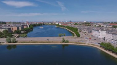 Aerial view of the Copenhagen in Denmark. Central historical part of the city, city roofs and Copenhagen lakes.