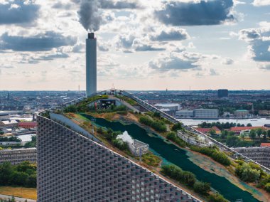 Amager Bakke, Amager Hill or Amager Slope or Copenhill - a heat and power waste-to-energy plant and a sports park in Amager, Copenhagen, Denmark. ESG green energy.