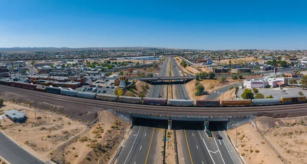 Aerial View Southwestern American Town Freight Train Crossing Highway Surrounded — Stock Photo, Image