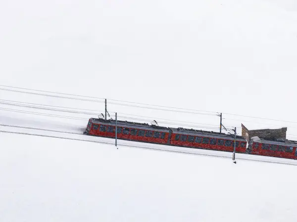Aerial Shot Red Cogwheel Train Zermatt Switzerland Gliding Snow Its — Stock Photo, Image