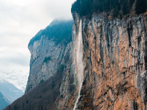 Stunning Waterfall Flows Cliffs Murren Switzerland Misty Mountainous Scene Its — Stock Photo, Image