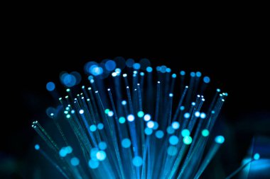 fiber optics with glowing particles and blur background