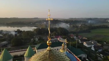 Aerial shot Village Mezhyrich. Holy Trinity Monastery Of The UPC. Ukraine. High quality 4k footage