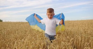 A child with a Ukrainian flag