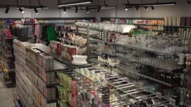A department for the sale of household goods, tableware, home textiles and household items in a large shopping mall.