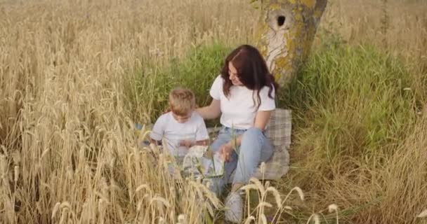 Happy Mother Takes Care Her Child Talks Her Reads Fairy — Vídeo de Stock