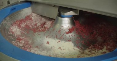 Spices are added to the stuffing in a centrifuge for mixing. High quality 4k footage