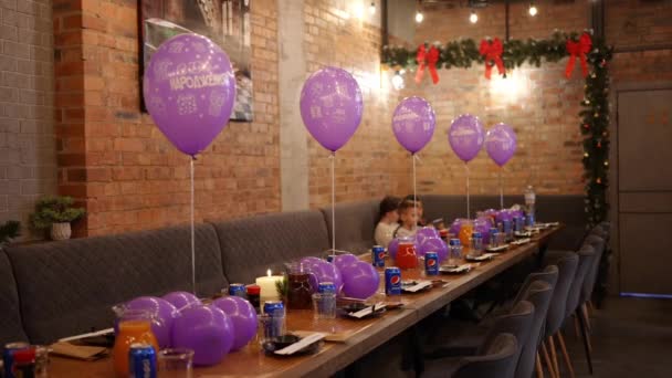 Children Sitting Cafe Festive Table Decorated Gel Balls Celebrating Birthday — Stockvideo