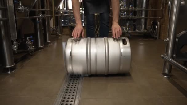 Man Rolls Heavy Full Keg Beer Floor Industrial Brewery — Wideo stockowe