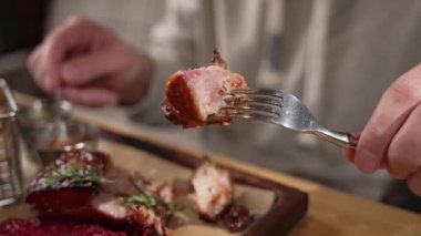 Pour hot sauce over a piece of juicy meat