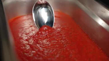 Tomato puree soup. Cooking. Making chili paste