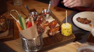 A person ordered meat and vegetables in a cafe