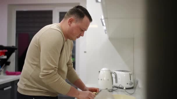Man Preparing Healthy Vegan Food Alone Home Smiling Cutting Fresh — Video