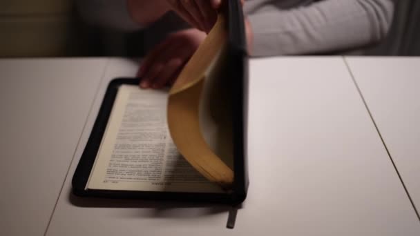 Man Opens Bible Reads Prayers While Sitting Table Home — Stockvideo