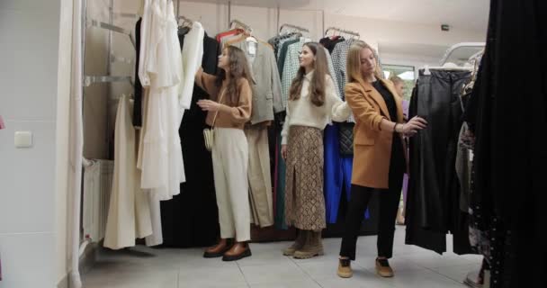 Girls Clothing Store Choose Fashionable Outfit — Stock video