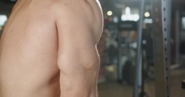 The guy is doing sports in the gym