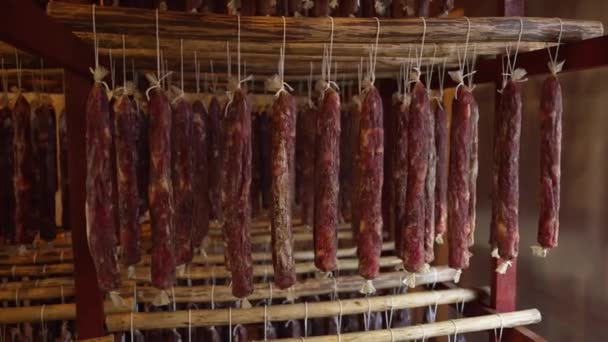 Delicious Italian Cured Prosciutto Hangs Ceiling Wooden Sticks Jamon Salt — Stock Video