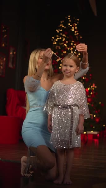 Happy Young Mother Evening Dress Helps Her Daughter Wearing Pearl — Stock Video