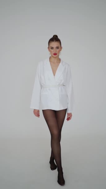 Stylish Female Model Poses Trendy White Blazer Sheer Black Tights — Stock Video