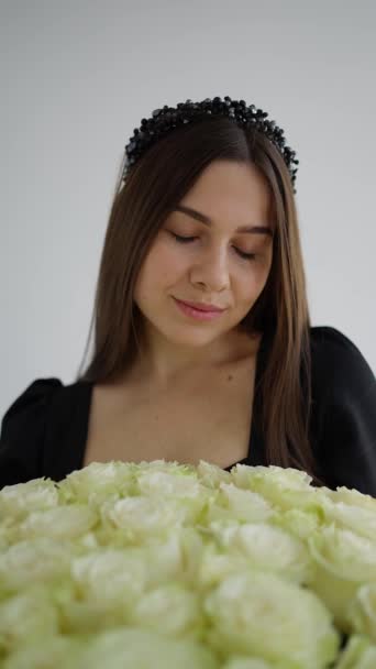 Surrounded Black Balloons Womans Radiant Smile Fresh Bouquet She Embraces — Stock Video