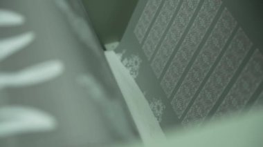 Tekstil Yazdırma Sürecinin Yakın Görüntüsü. Hassas makine baskıları tekstil üzerine karmaşık tasarımlar.