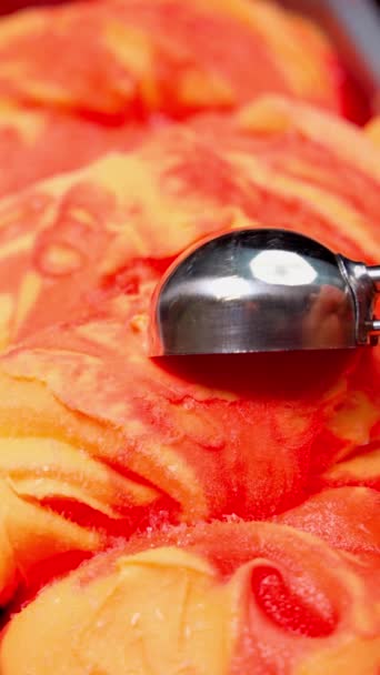 Close Peach Ice Cream Scooped Out Container Spoon — Wideo stockowe
