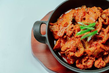 jeyukbokkeum, Korean style stir-fried pork : Thinly sliced pork marinated in spicy ginger-gochujang and stir-fried with onion, carrots, perilla leaves, or abbage. Ingredients vary according to taste.