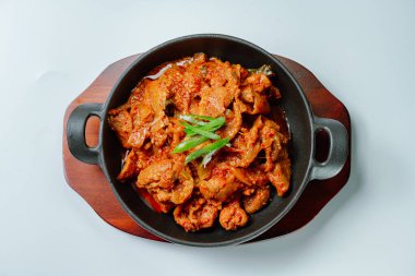 jeyukbokkeum, Korean style stir-fried pork : Thinly sliced pork marinated in spicy ginger-gochujang and stir-fried with onion, carrots, perilla leaves, or abbage. Ingredients vary according to taste.