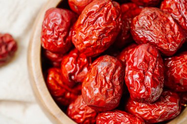 fresh korean jujube fruit in wood bowl