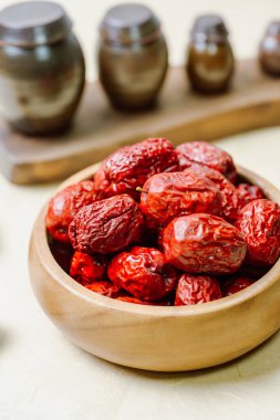fresh korean jujube fruit in wood bowl