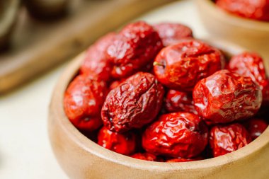 fresh korean jujube fruit in wood bowl