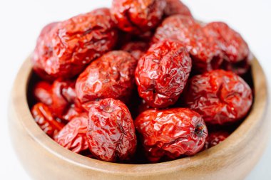 fresh korean jujube fruit in wood bowl