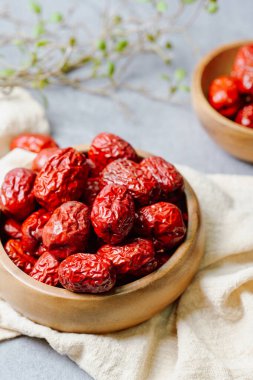 fresh korean jujube fruit in wood bowl