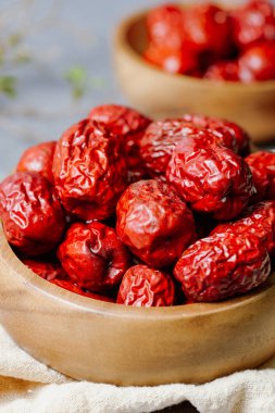 fresh korean jujube fruit in wood bowl